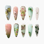 Handmade press-on nails set with pastel colors, 3D floral and butterfly designs, jewel accents