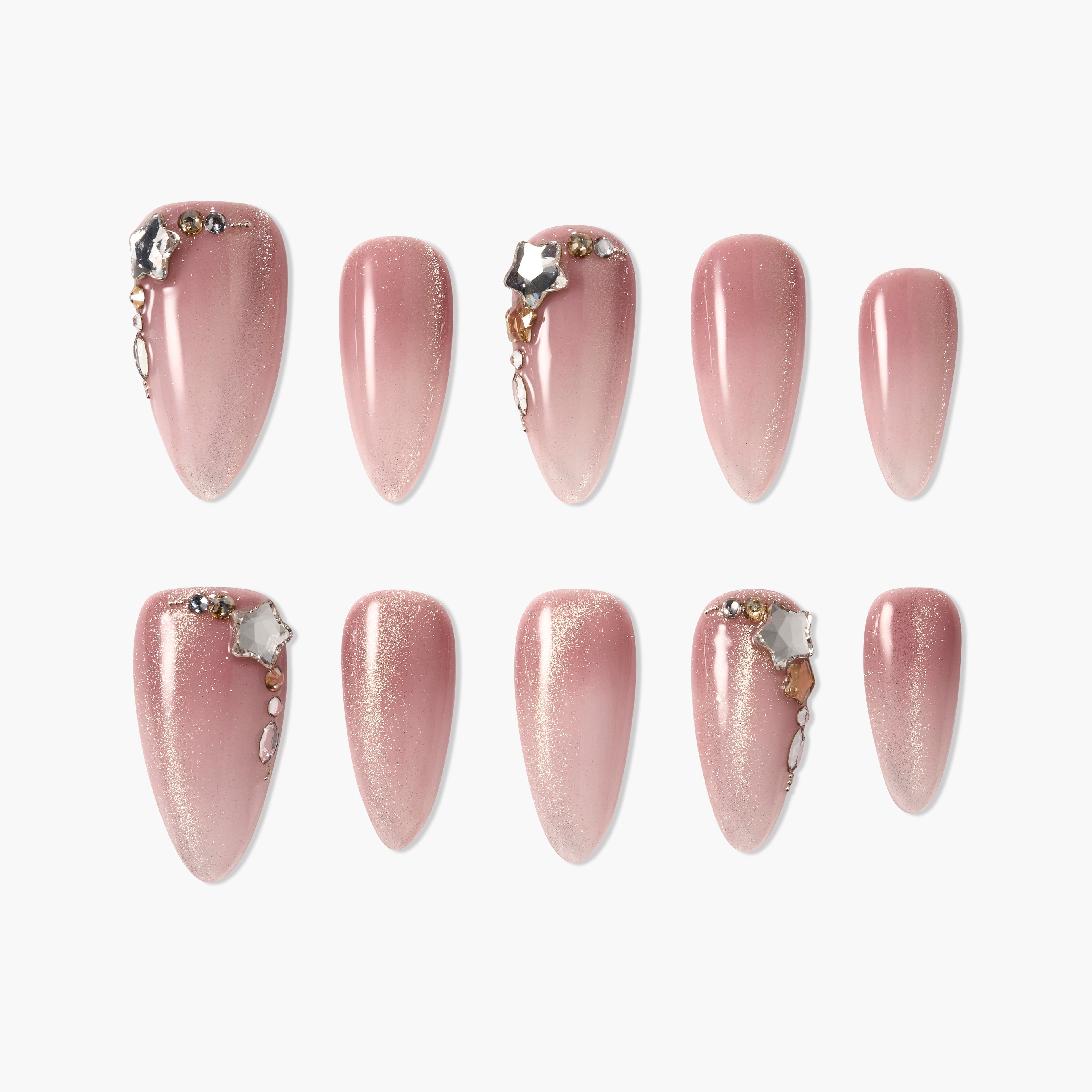 Set of glittery pink press-on nails with star-shaped rhinestones and gold accents