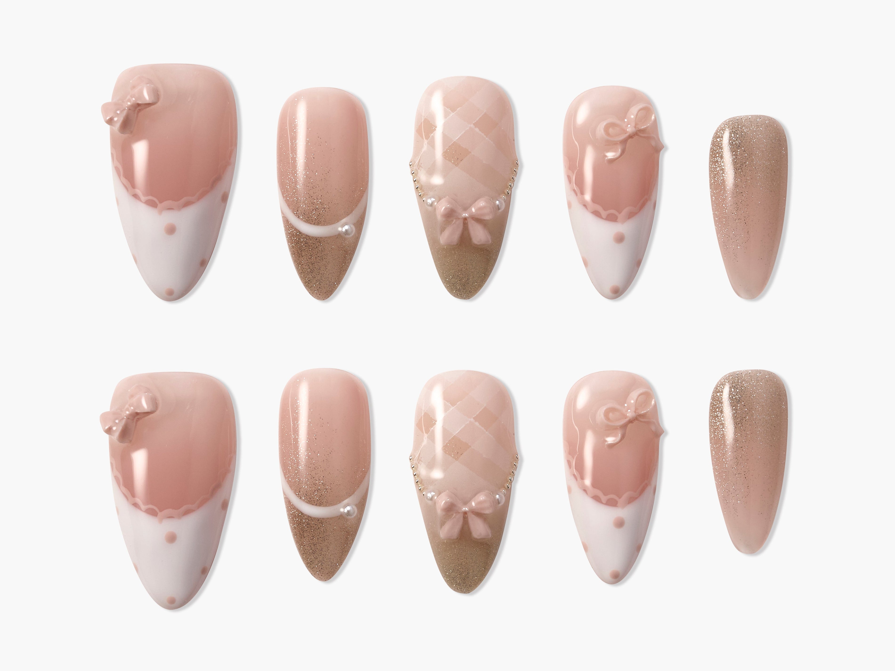 Handmade pink press-on nails with bows, pearls, glitter, and plaid designs, set of ten.