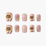 Set of pink shimmer press-on nails with 3D cat donut design and heart accents