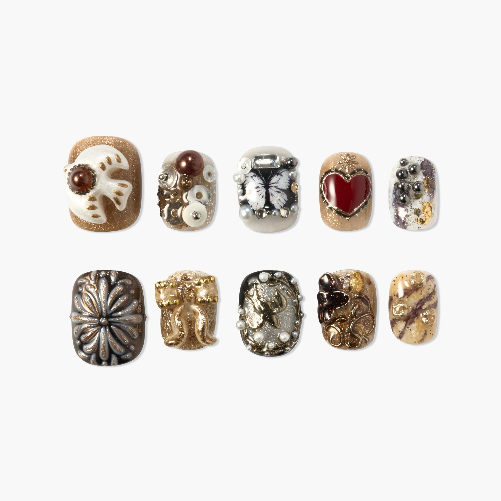Set of ten decorative press-on nails with designs including bird, butterfly, red heart, pearls, gold accents, and black floral motifs