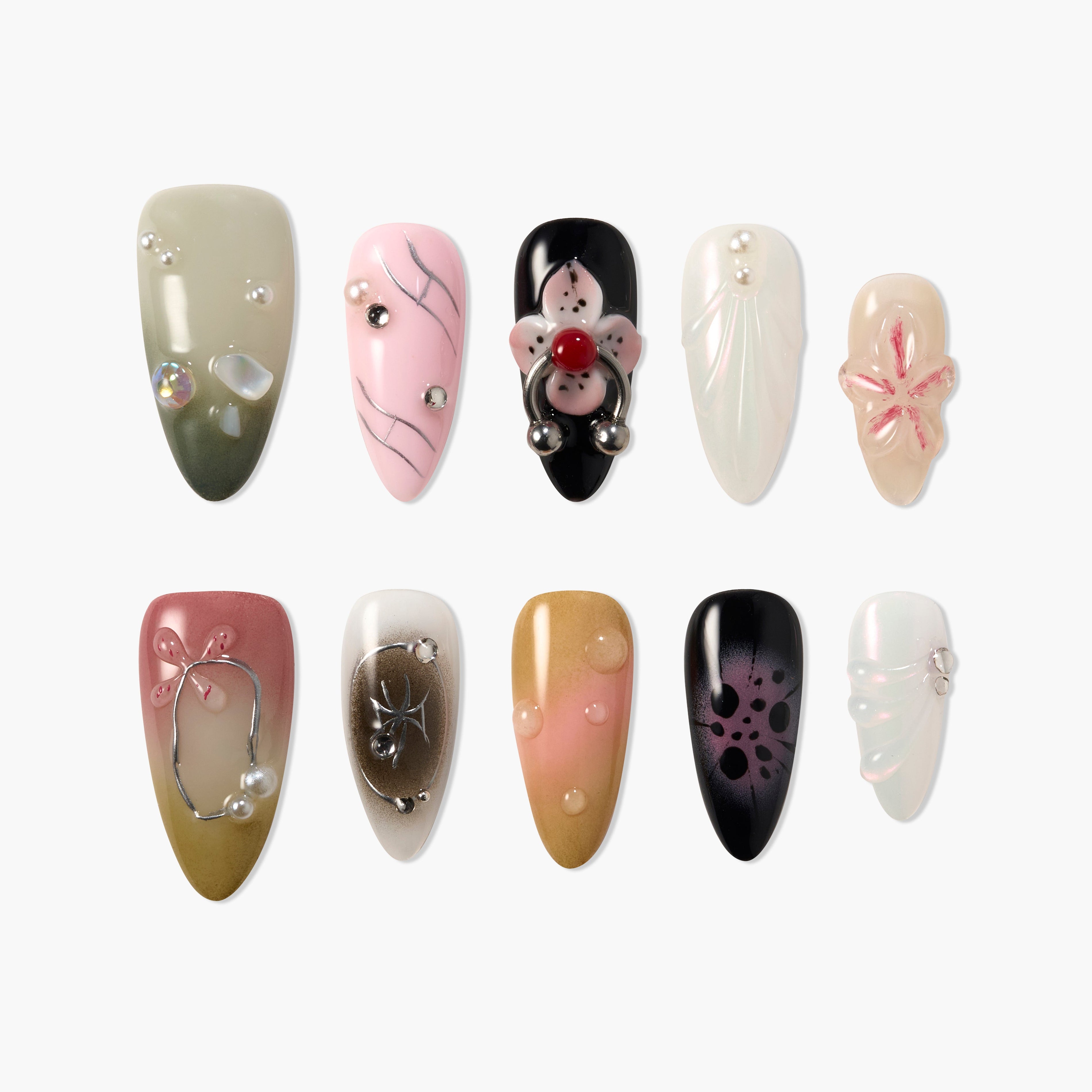 Set of 10 unique press-on nails with various designs including pearls, flowers, abstract art, and metallic accents