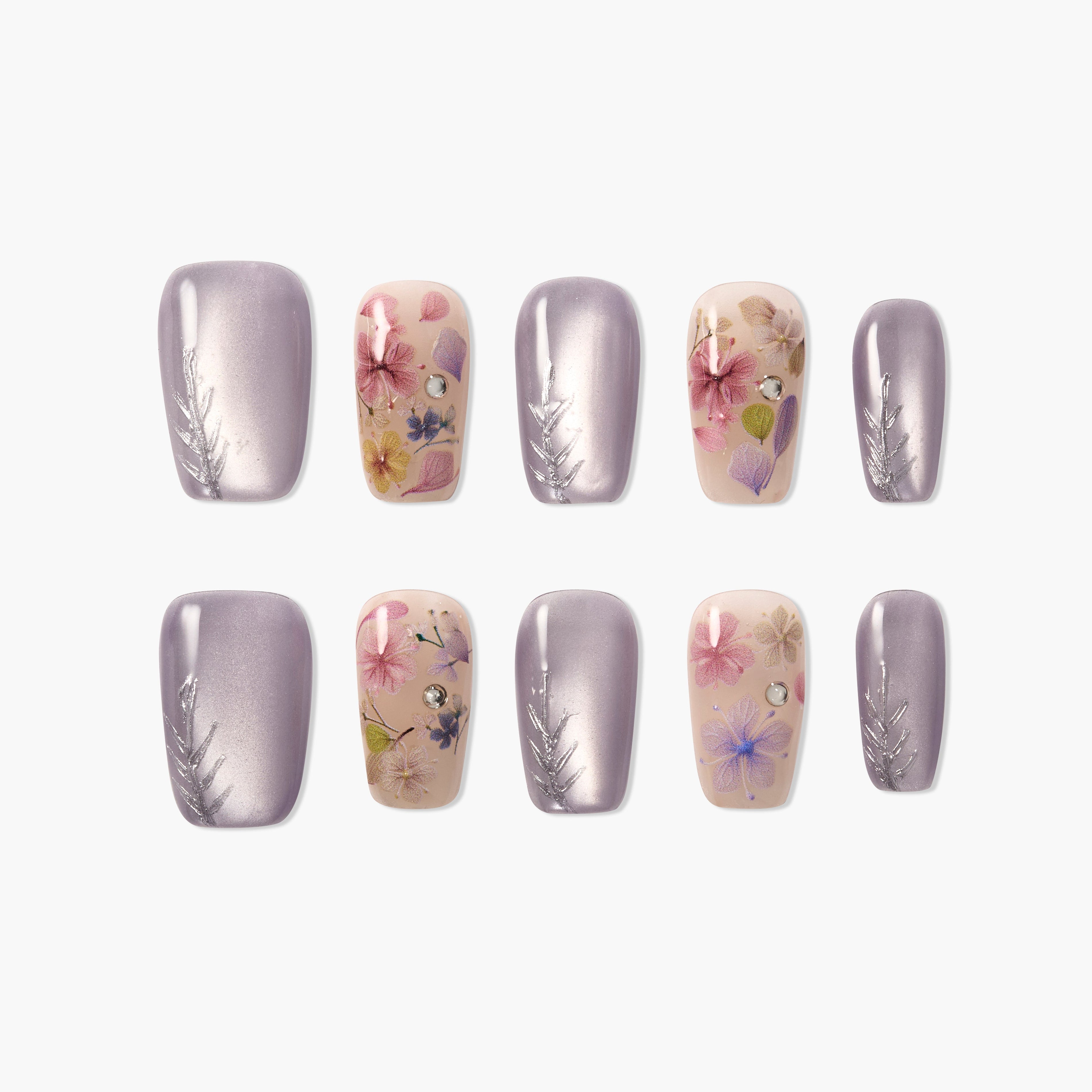 Set of 10 press-on nails with lavender shimmer and floral designs featuring pink, purple, and yellow flowers