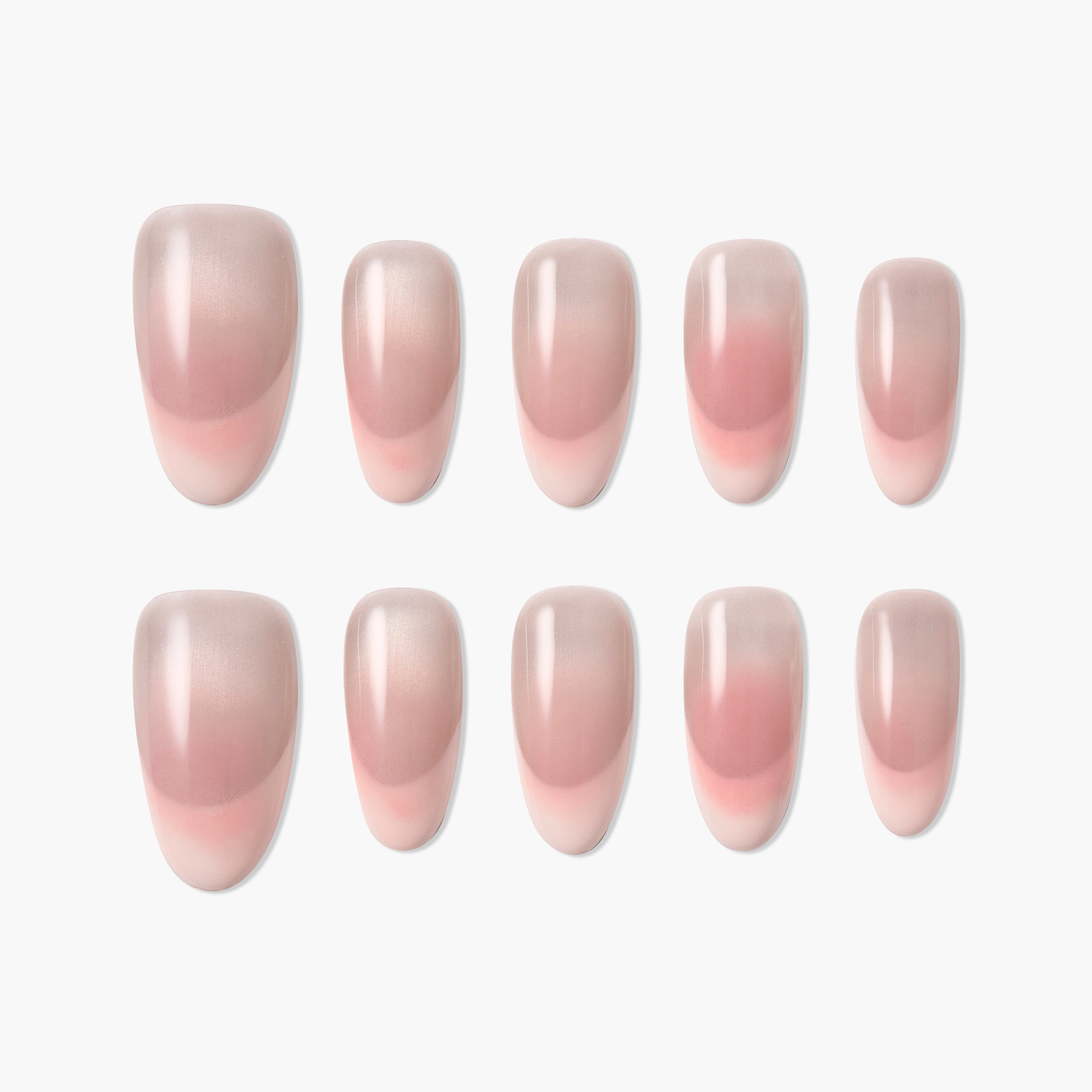 Set of 10 ombre press-on nails in soft pink gradient with glossy finish on white background