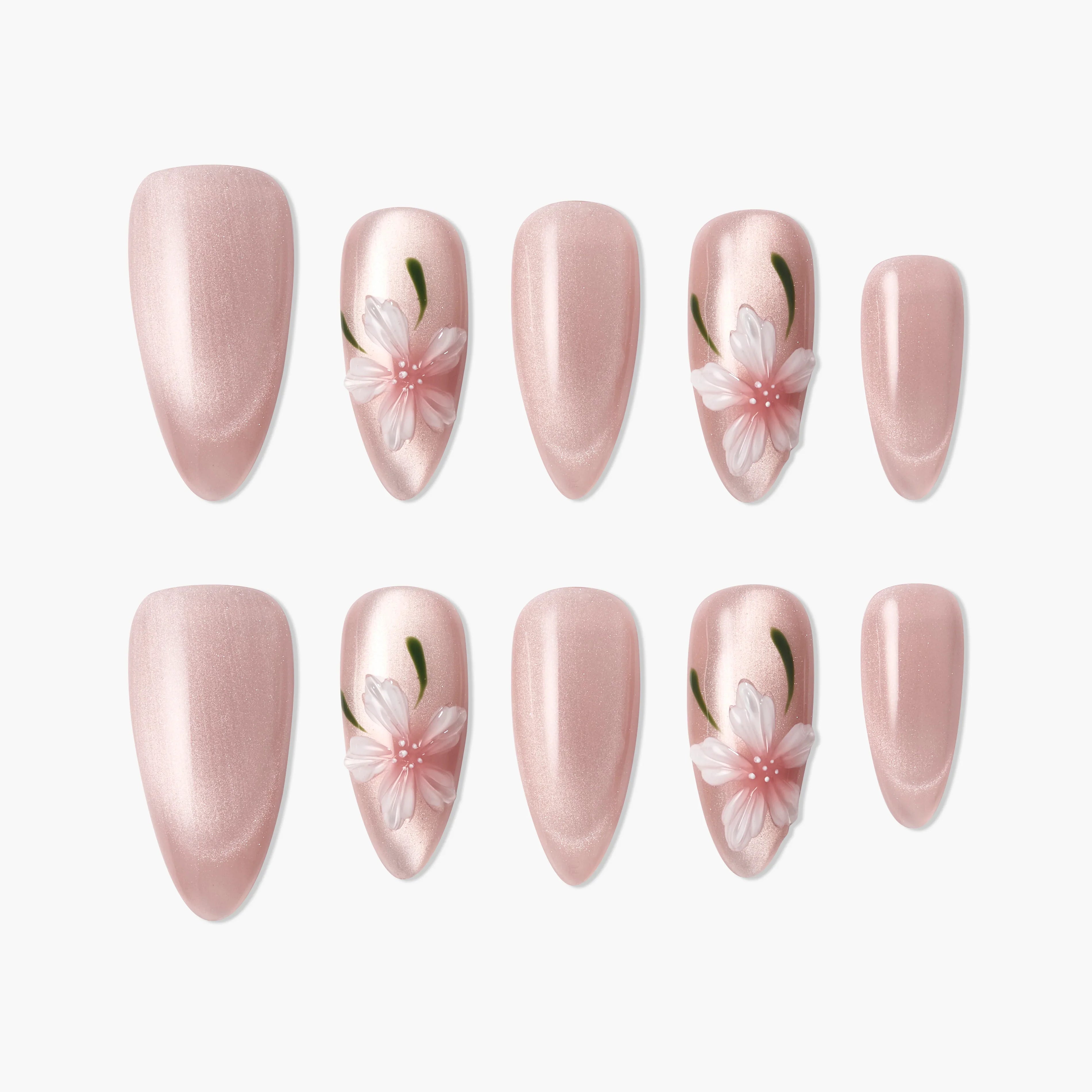 Glossy pink handmade press-on nails with 3D white floral and green leaf accents