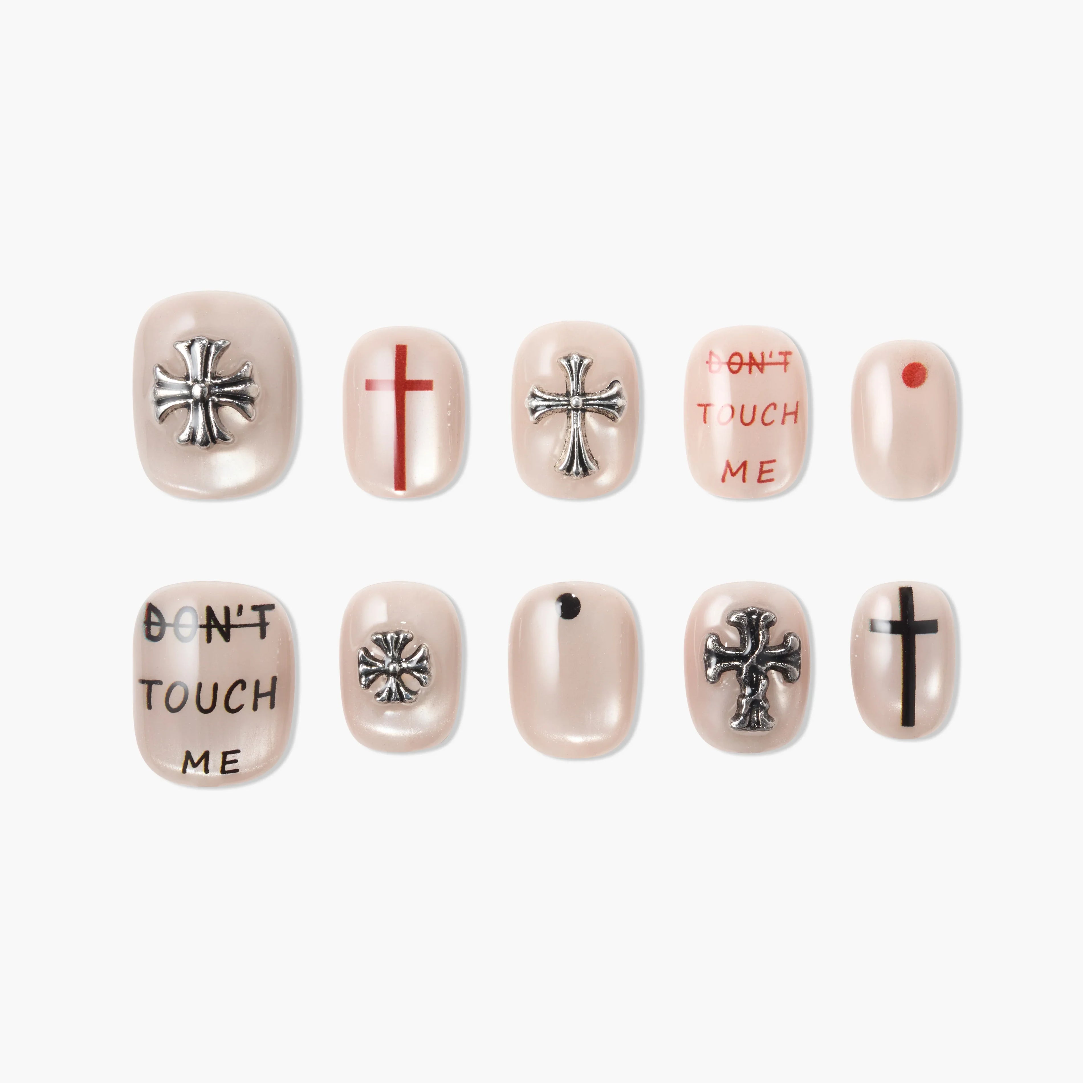 Handmade press-on nails set with beige base, cross charms, text, dots, and minimal black or red designs.