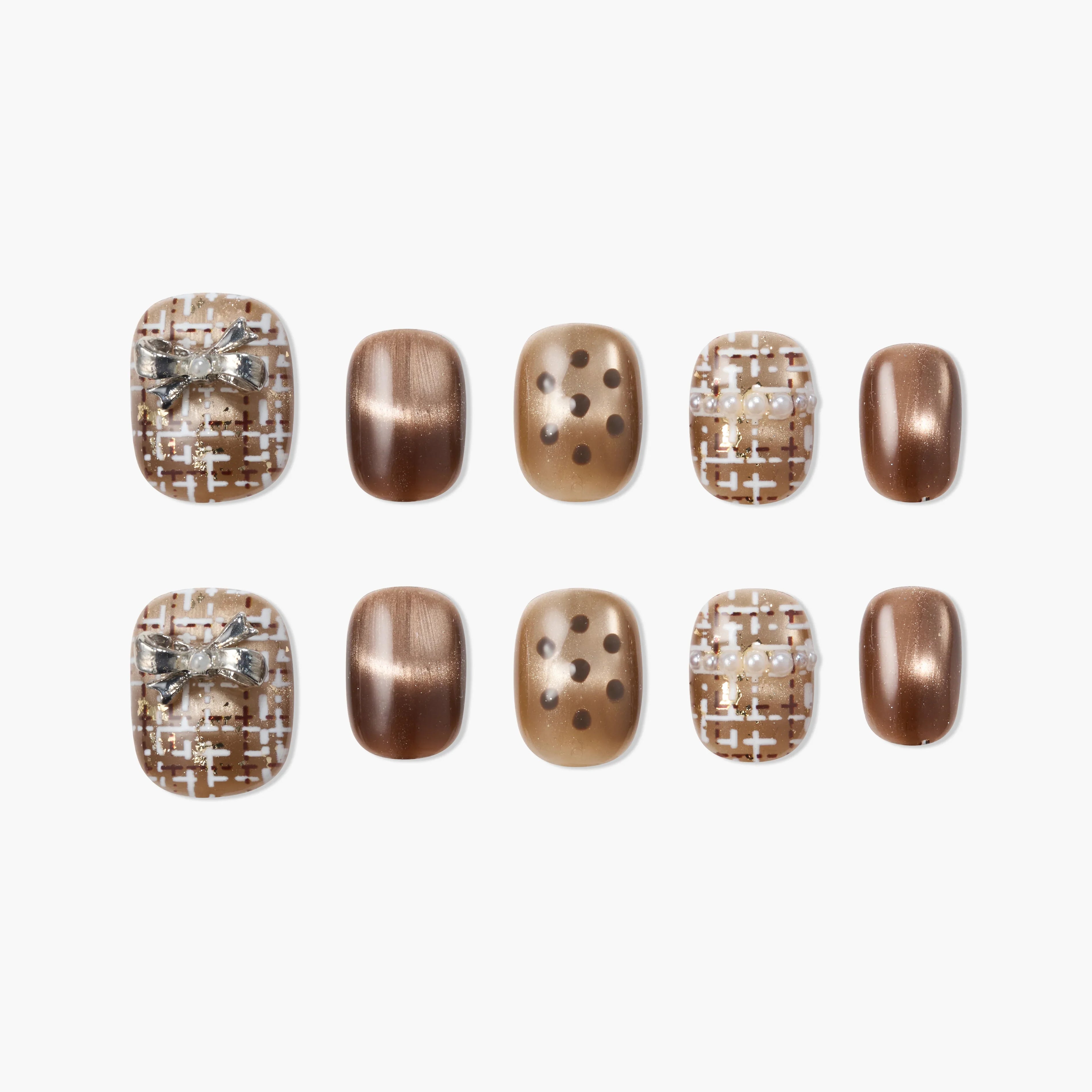 Handmade press-on nails with brown, gold, plaid, bow, pearl, and polka dot designs