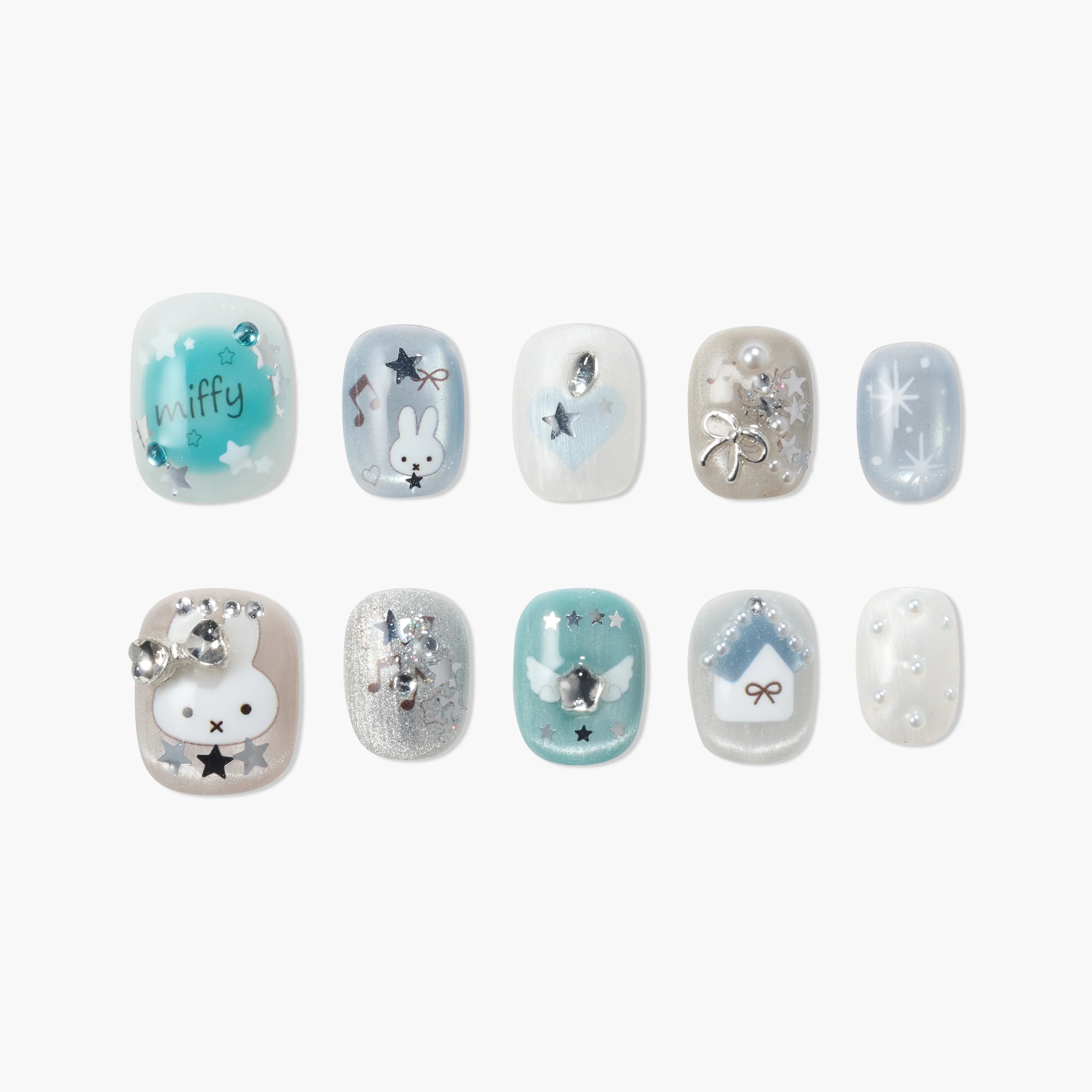 Handmade blue and silver press-on nails with cartoon bunny, stars, bows, and 3D embellishments