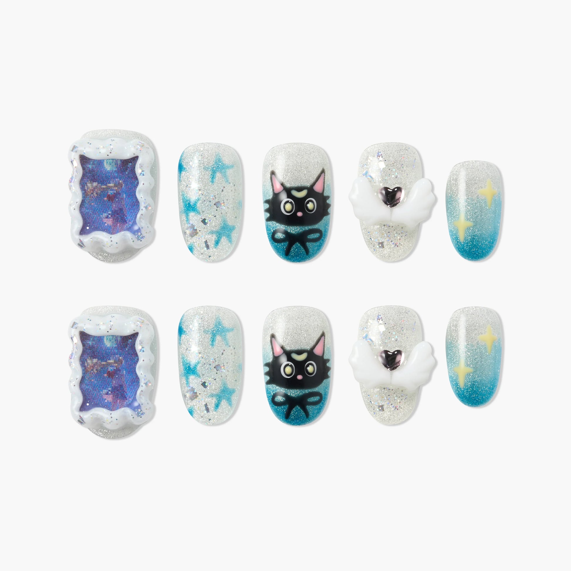 Handmade press-on nails with glitter, blue stars, black cat face, and 3D wing heart designs