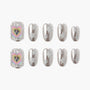 Silver press-on nails with glitter stars and cartoon heart accent design, handmade nail set