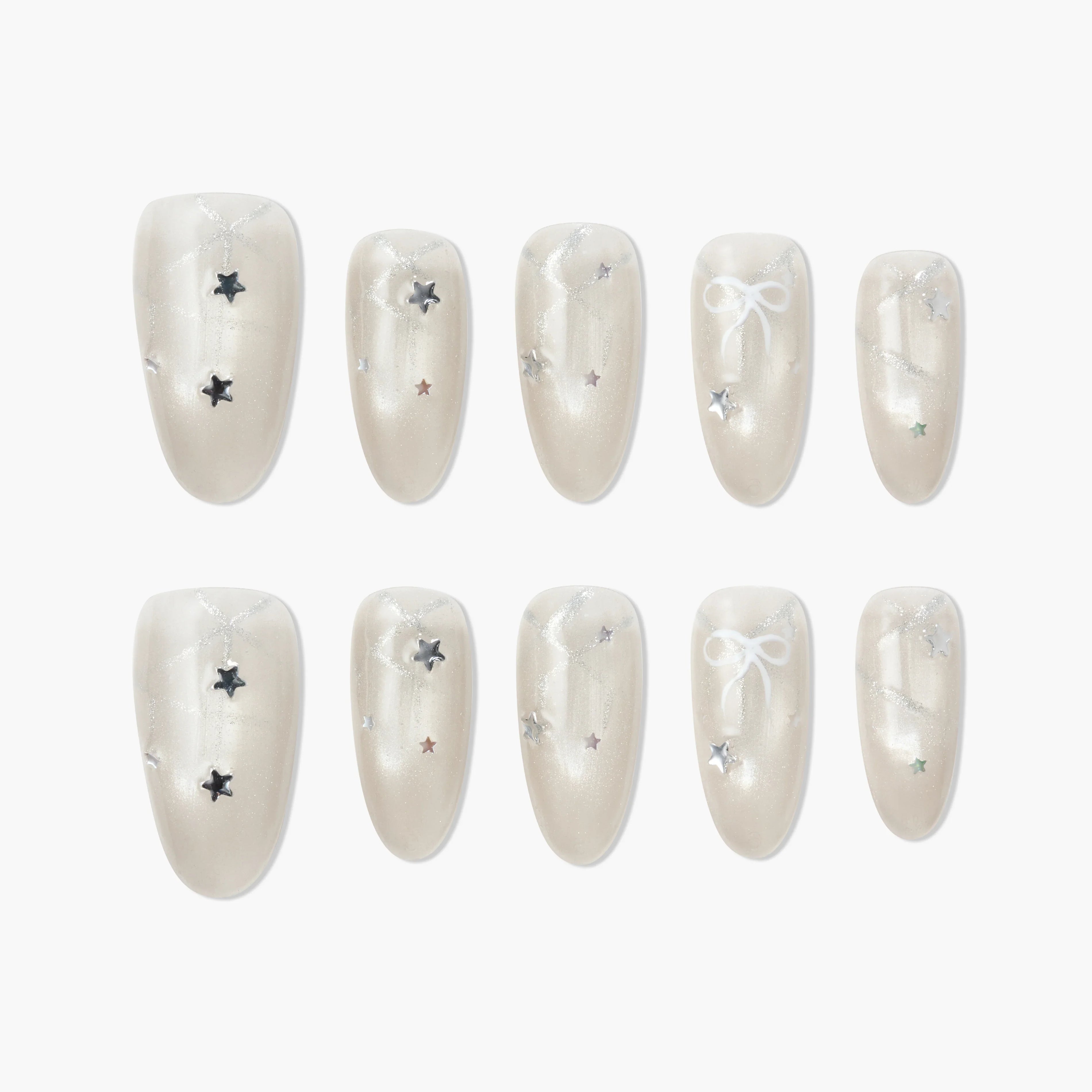Pearl white press-on nails with silver glitter, star accents, and bow design, glossy finish