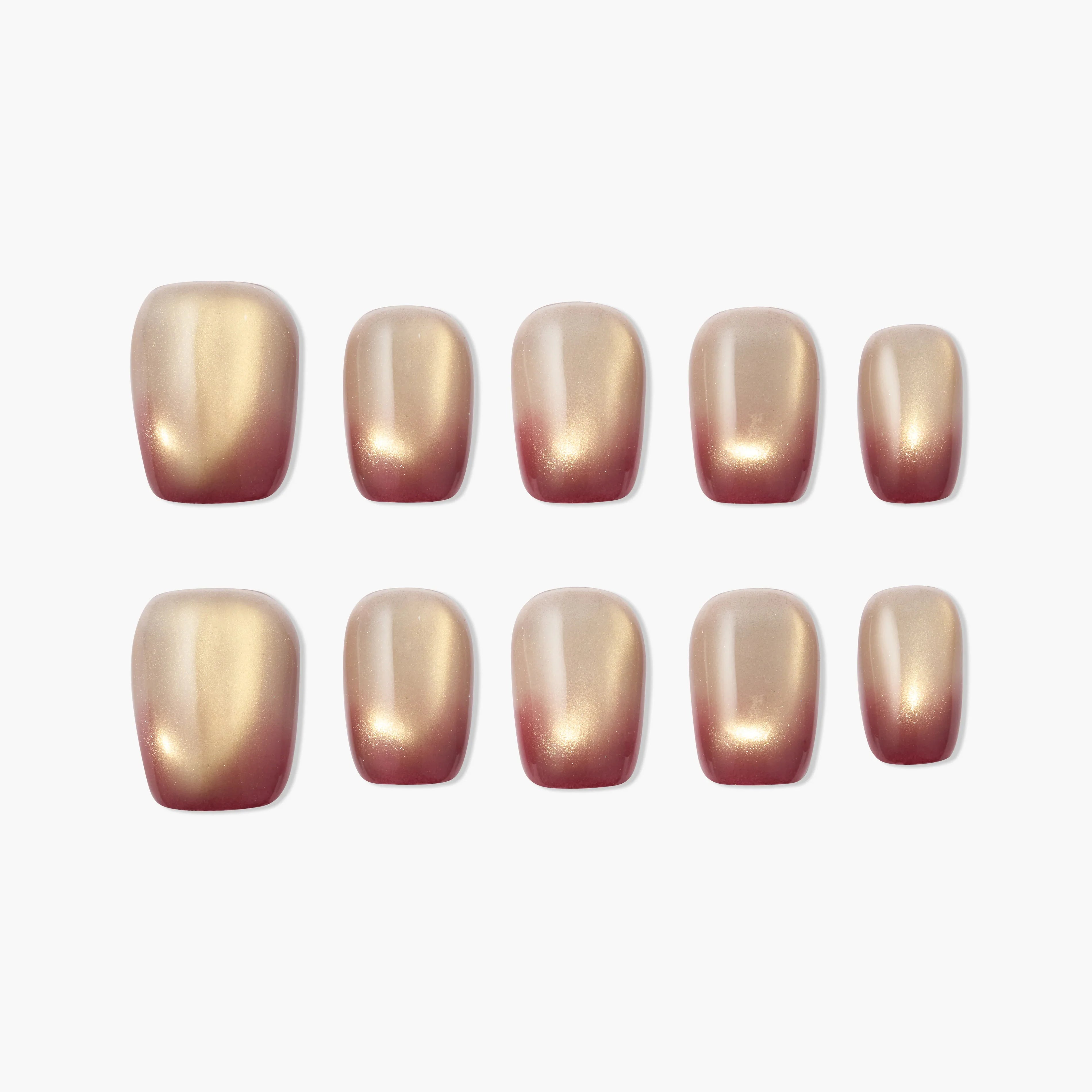 Set of gold and burgundy ombre press-on nails with a glossy finish on white background
