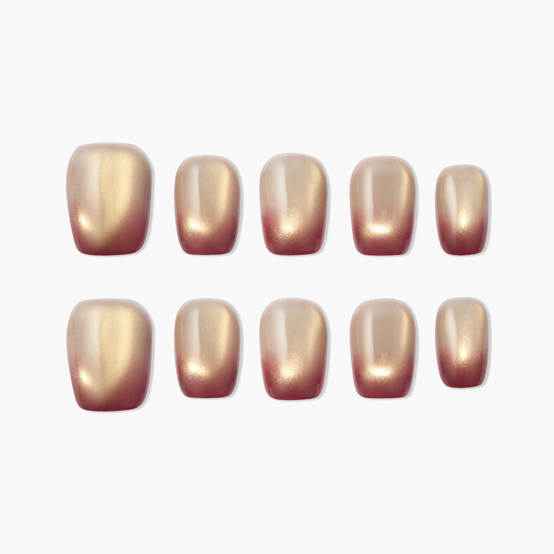 Set of gold and burgundy ombre press-on nails with a glossy finish on white background