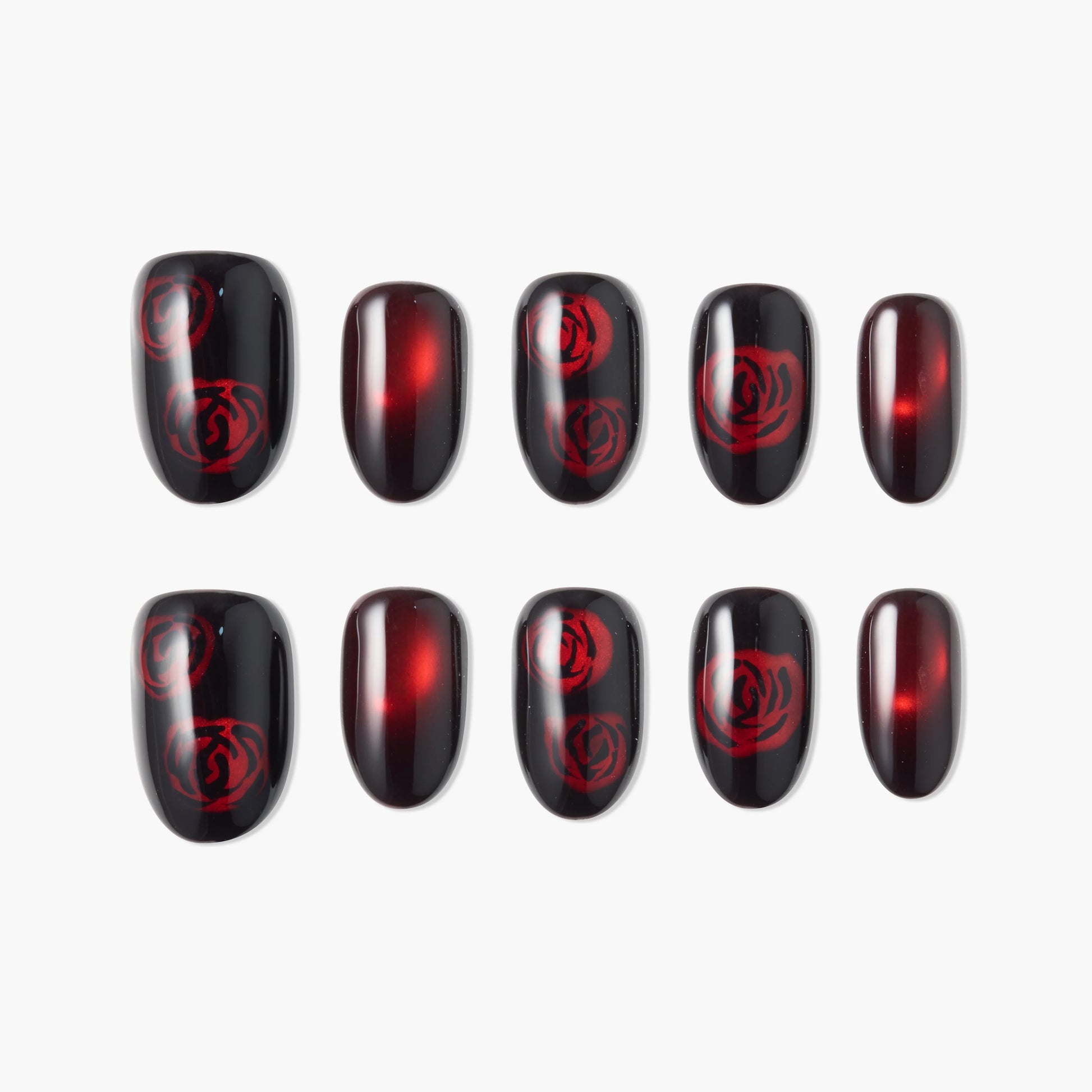 Black and red press-on nails with red rose designs and glossy finish, displayed on white background.