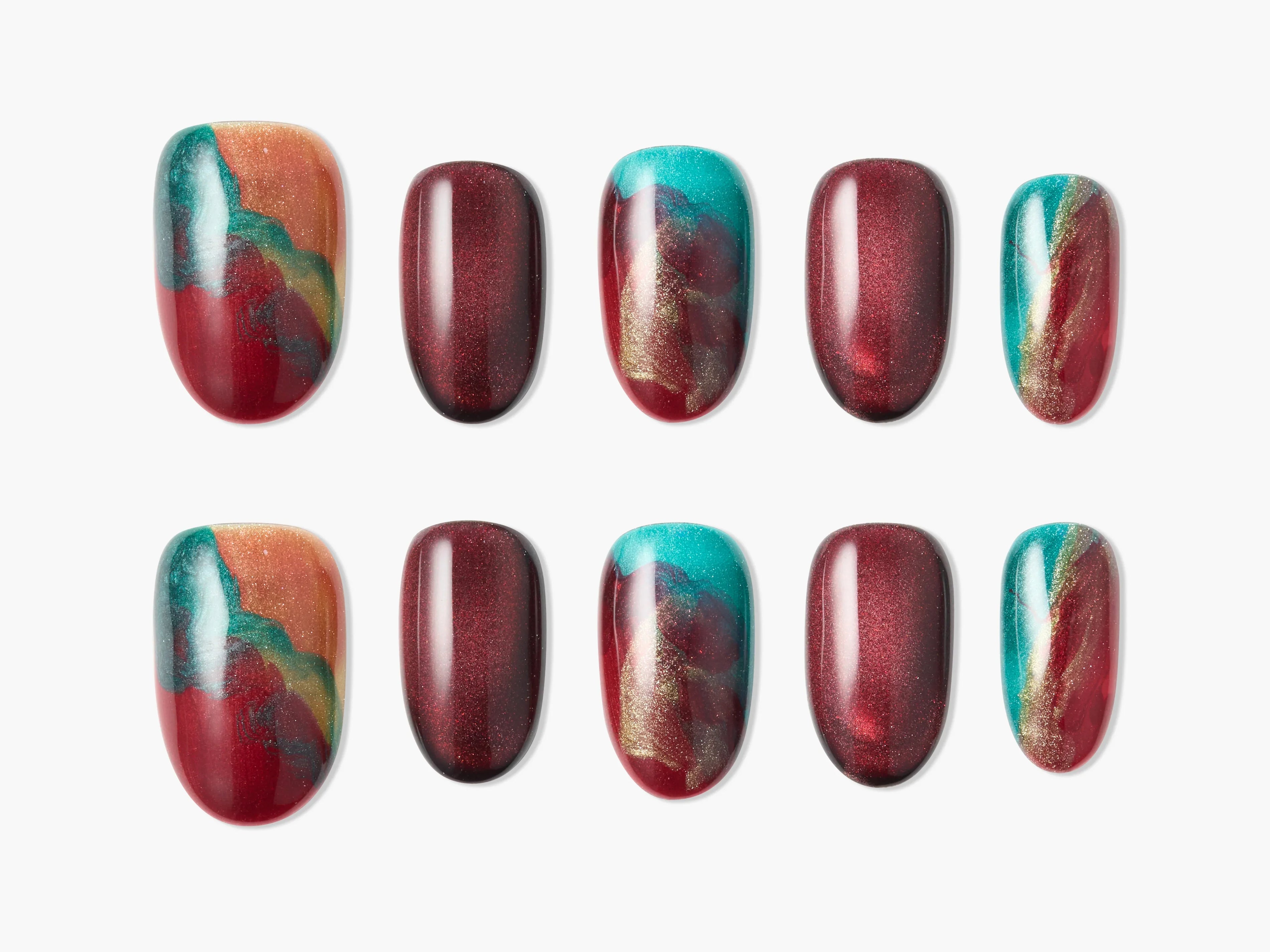 Handmade press-on nails with red, turquoise, and gold abstract swirl design.
