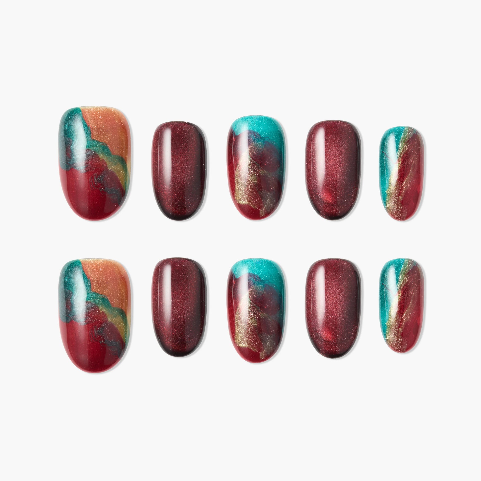 Handmade press-on nails with red, turquoise, and gold abstract swirl design.