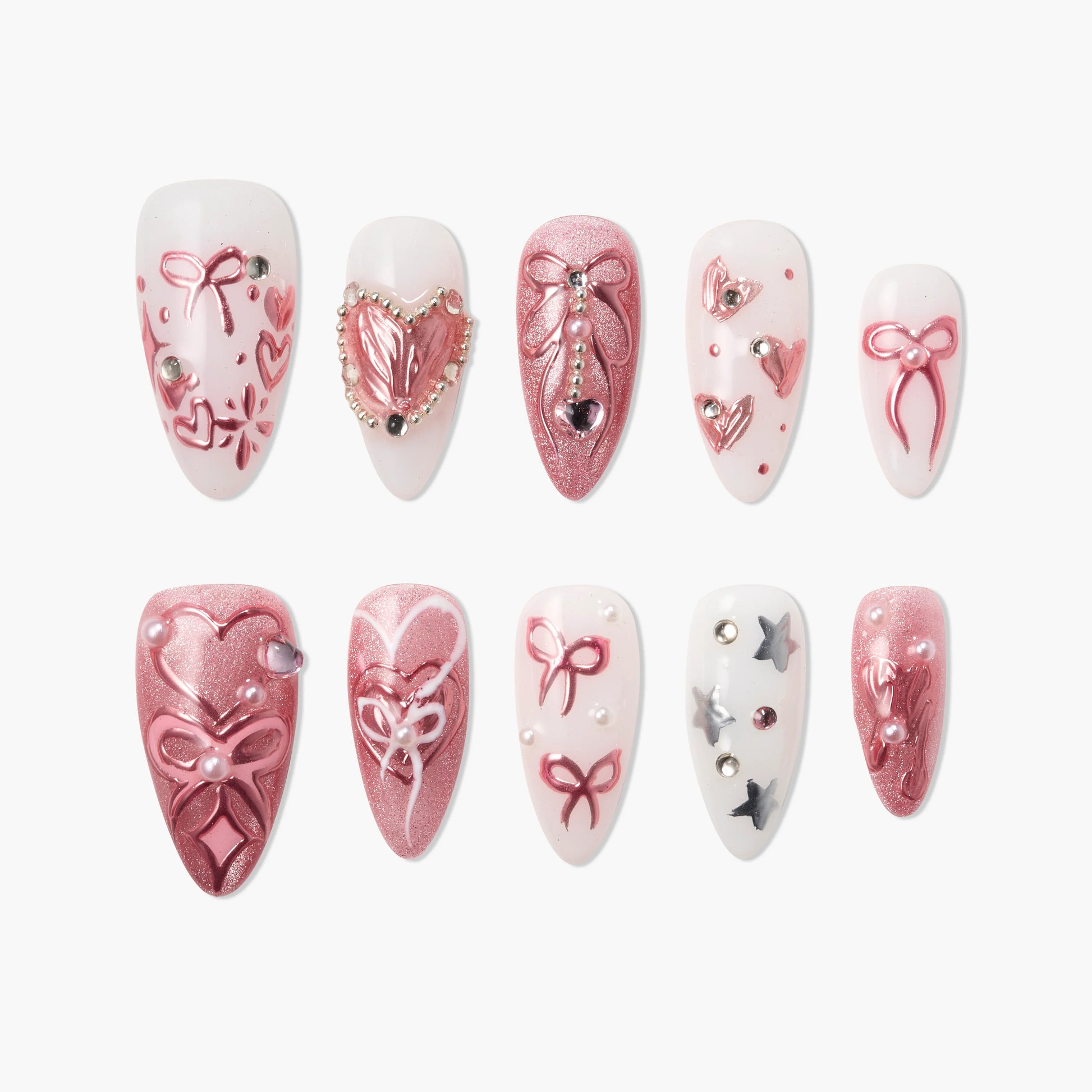 Pink and white handmade press-on nails with bows, hearts, pearls and star designs