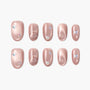 Glossy pink press-on nails with iridescent butterfly accents and marble swirl patterns