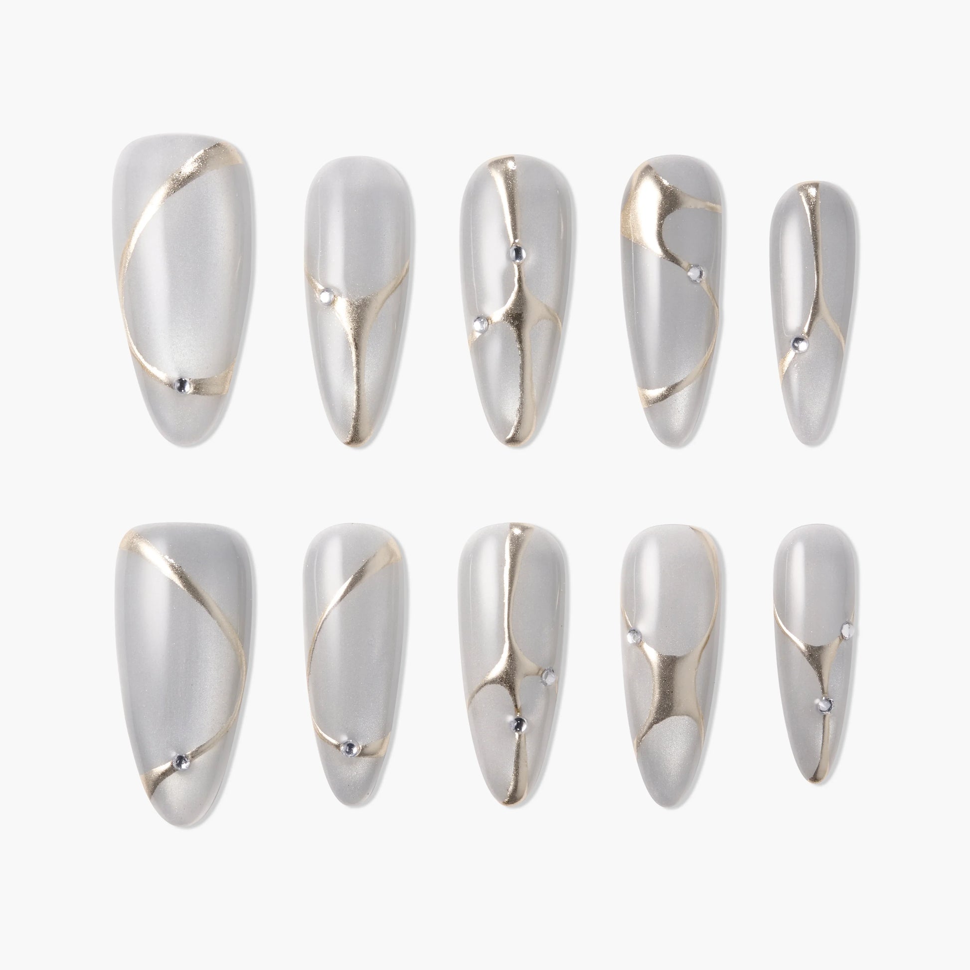 Set of gray press-on nails with gold lines and small silver rhinestone accents.