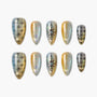 Handmade press-on nails with gold, silver gradient, black geometric and floral designs