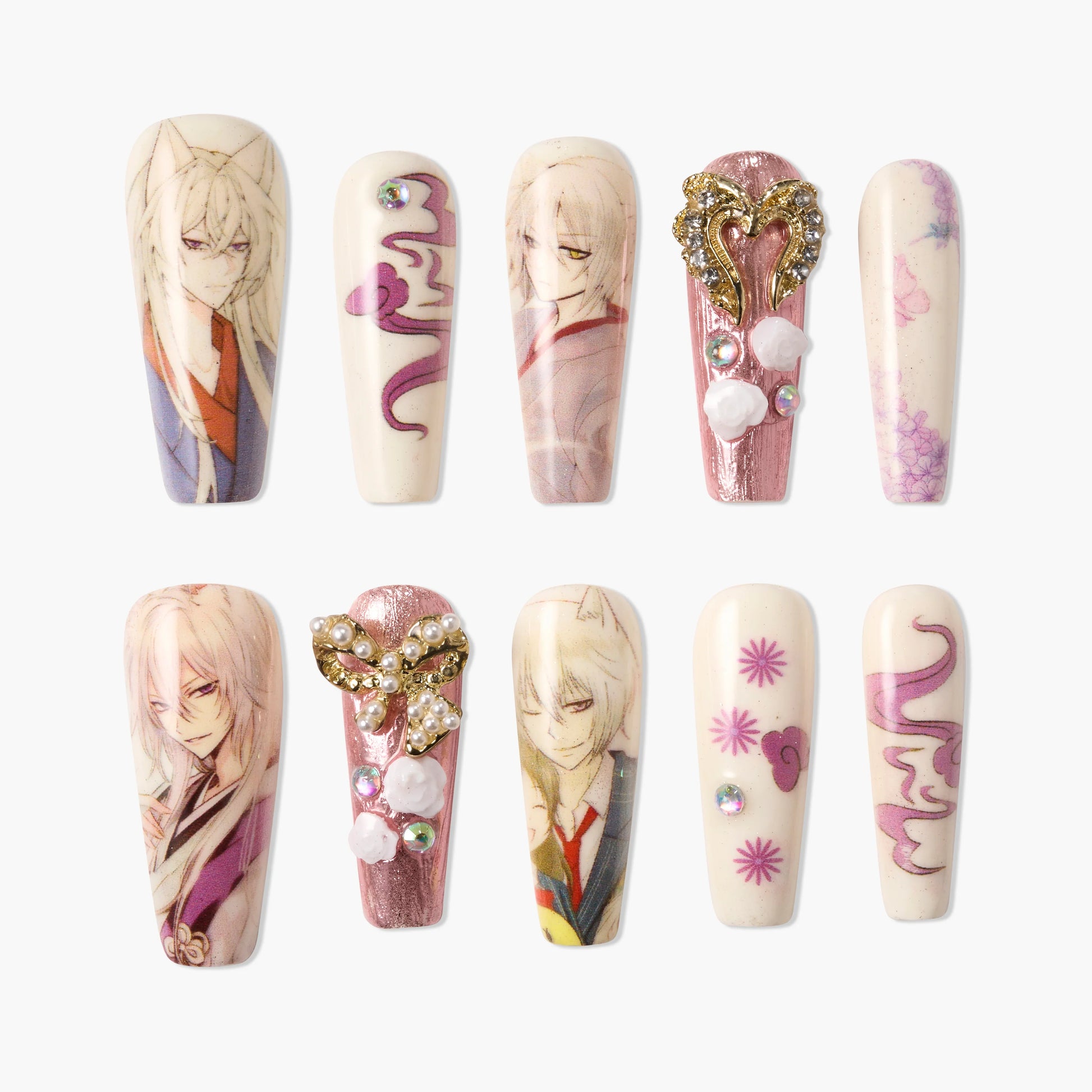 Anime-inspired press-on nails set with fox character art, pink accents, and gemstone embellishments