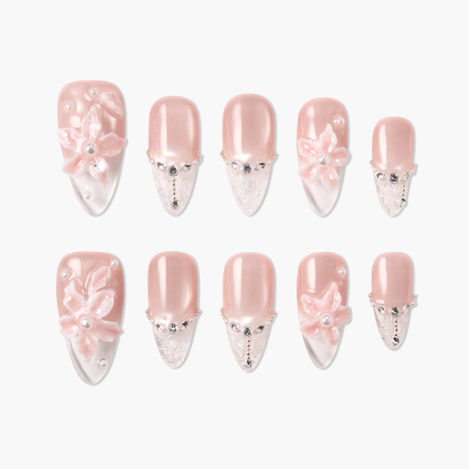 Handmade pink press-on nails with 3D floral designs, pearls, and rhinestone accents