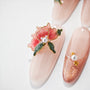 Elegant nude pink gel nails with 3D red flower and pearl nail art decoration
