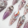 Handmade press-on nails with purple ombre and large 3D rhinestone crystal designs