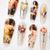 Set of stylish artificial nails featuring male anime character designs, hearts, and decorative crystals